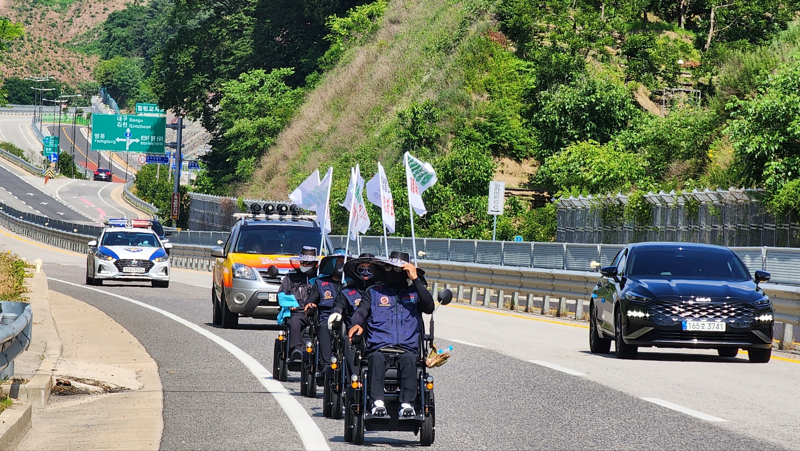기초생활보장법 개정촉구 전동휠체어 국토종단 관련 사진 19